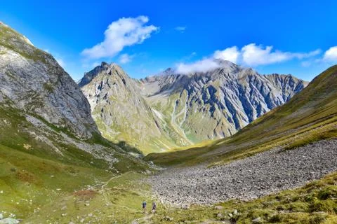 Hiking in alpine mountain Stock-Fotos