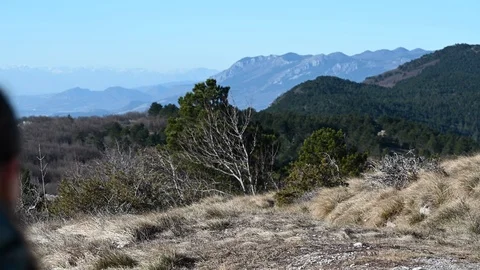 Hiking with beautiful mountains at the background Stock Footage 125258533