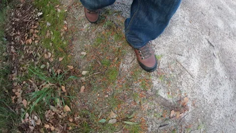 Hiking boots on the track Stock Footage 142096038