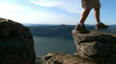 Hiking the Cliff Stock Footage 727065