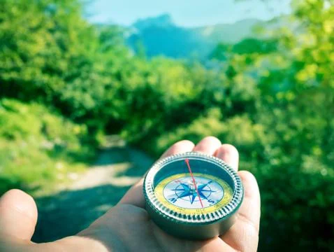 Hiking with compass Stock Photos