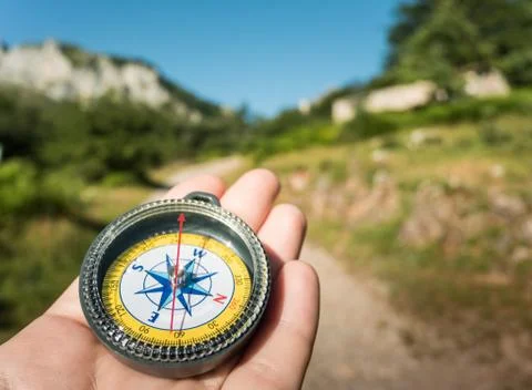 Hiking with compass Stock Photos