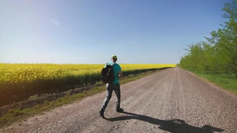 Hiking in the fields outside the city Stock Footage 92336408