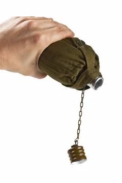 Hiking flask in hand Stock Photos