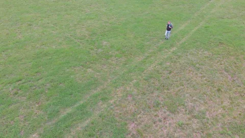 Hiking in green nature environment at springtime. Aerial  view video. Stock Footage 106523608