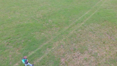 Hiking in green nature environment at springtime. Aerial  view video. Stock Footage 106533367