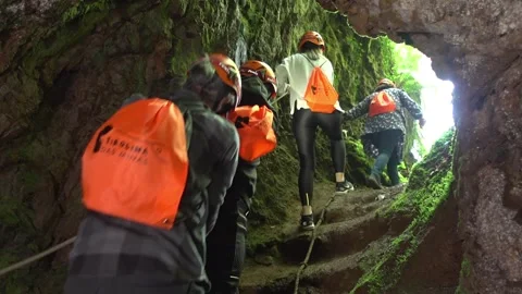 Hiking Group Exiting Galleries of an Old Abandoned Mine  - 32 Video stock 308401551