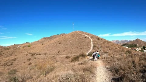 Hiking group walk toward mountain top and reach Lac Blancs in Chamonix France 動画素材 144776853