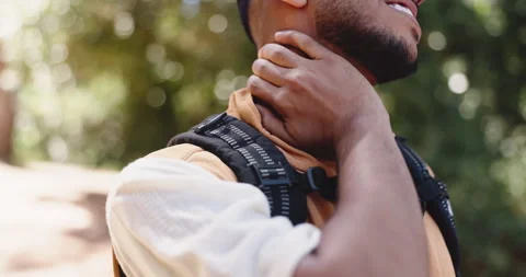 Hiking, hand and man with shoulder pain, travel and countryside with Stock Footage 325834840