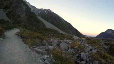 Hiking At Hooker Valley Track, Pan Right To Sunset View At Tasman Valley Video stock 55757397