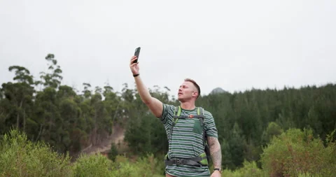 Hiking, man and phone problem in nature with connection fail, error or 404 Stock Footage 259161111
