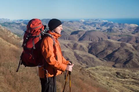 Hiking man with backpack Stock Photos