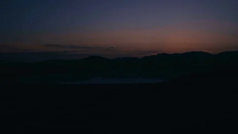 Hiking on the mountain at sunset Stock Footage 77915601