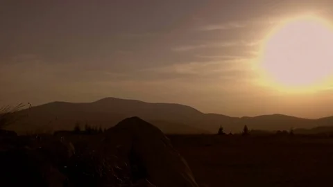Hiking on the mountain at sunset Stock Footage 78569604
