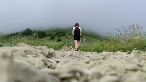Hiking in the mountains Stock Footage 180686512