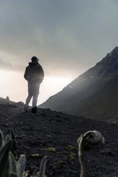 Hiking in the mountains at sunset Stock Photos
