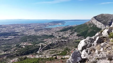Hiking in the mountains with the view to the city of Split Video stock 268597370
