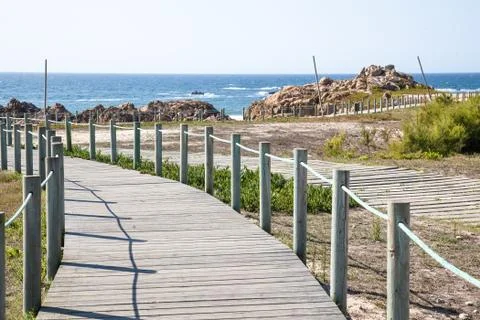 Hiking path on coast Stock Photos