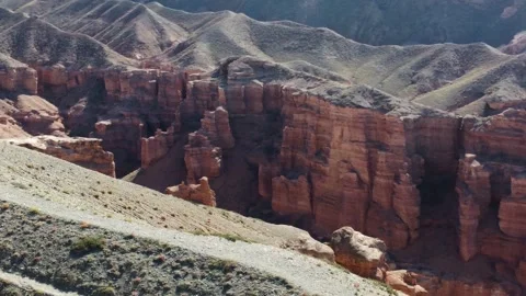 Hiking path on a mountain ridge, Martian Charyn Canyon, Kazakhstan Stock Footage 336101720
