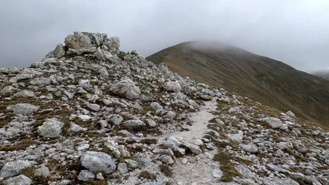 Hiking on a path to the top of the mountain. Stock Footage 133286082