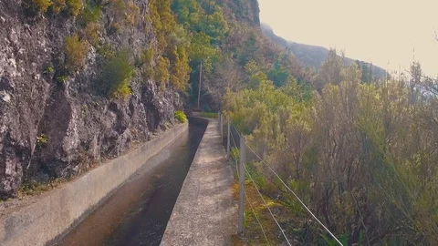 Hiking Pathway on the Levada Waterway Stock Footage 72003095