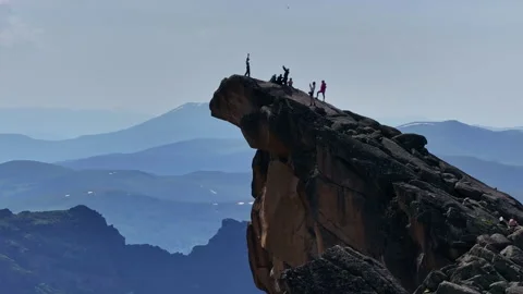 Hiking to the Peak of a Mountain in the Summer Stock Footage 278321751