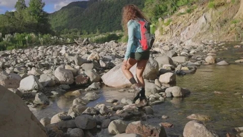 Hiking up a rocky river bed, Coromandel, New Zealand Stock Footage 152451073