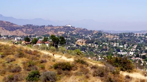 Hiking Runyon Canyon with a View of The Hollywood Sign Stock Footage