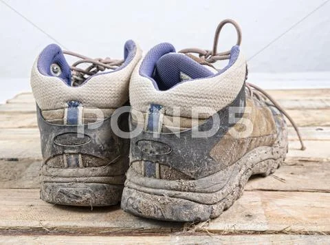 Hiking shoes dirty Stock Photos