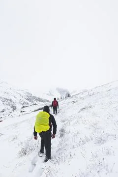 Hiking in the snow Stock Photos