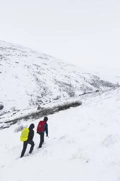 Hiking in the snow Stock Photos