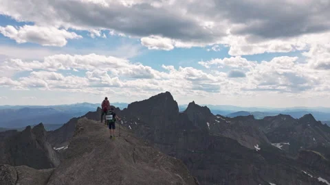 Hiking to the Summit of a Mountain in the Summer Stock Footage 278321661