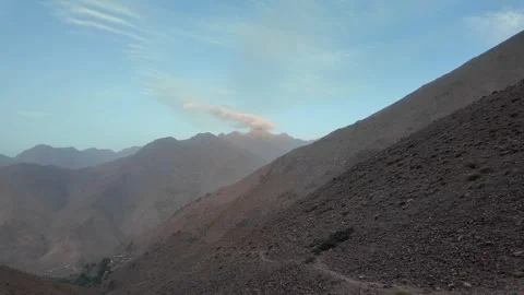 Hiking to the Summit: Reaching Iferouane Peak in Toubkal National Park, Morocco Stock Footage 285870397