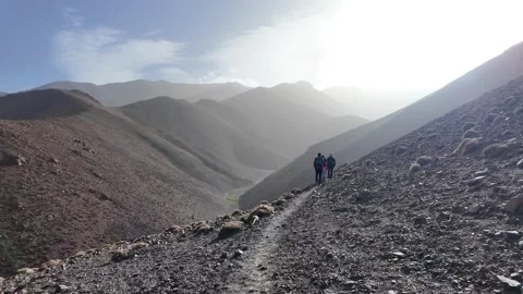 Hiking to the Summit: Reaching Iferouane Peak in Toubkal National Park, Morocco Stock-Footage 285870683