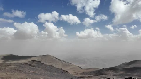 Hiking to the Summit: Reaching Iferouane Peak in Toubkal National Park, Morocco Stock Footage 285876181