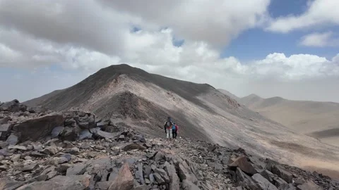 Hiking to the Summit : Reaching Iferouane Peak in Toubkal National Park, Morocco Video stock 285934484