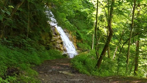 Hiking tail with water fall Stock Footage 6218549