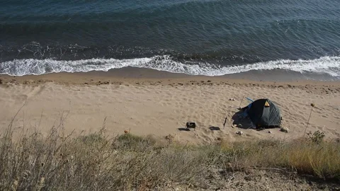 Hiking tent on the beach Stock Footage 115123164