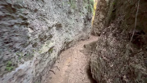 Hiking through limestone cave trail, motion shot, 4k. Stock Footage 270073208