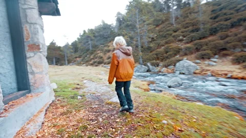 Hiking through the Pyrenees in Spain during a cool afternoon Stock Footage 303628366