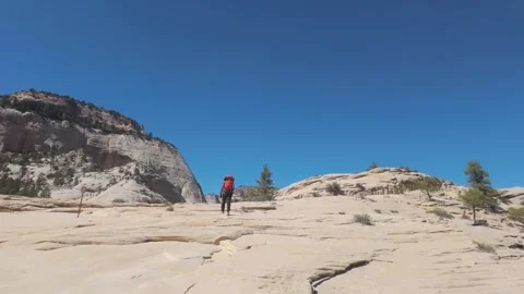 Hiking through Rocky Cliffs Video stock 334684913