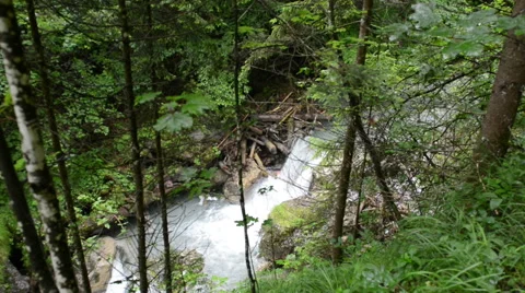 Hiking through the Wolfsklamm wolf gorge on stairs in european alps. 스톡 동영상 66512959