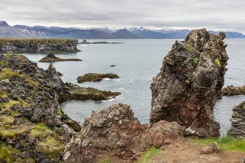 Hiking trail Anarstapi to Hellnar along rocky coast Iceland Stock Photos