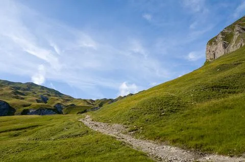 The hiking trail between the mountains Stock Photos