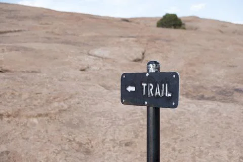 Hiking trail marker on the path to Delicate Arch in Arches National Park Stock Photos