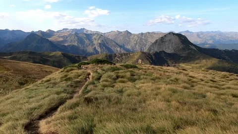 Hiking on a trail in the mountains Stock Footage 146040126