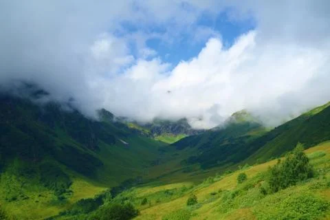 Hiking trail to Silver lakes with clouds around the mountains going via Tobav Stock Photos