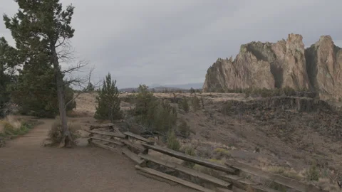 Hiking trail with view of dramatic cliffs at Smith Rock Stock Footage 332363715