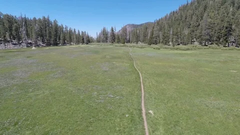 Hiking in a Valley Stock Footage 87193796