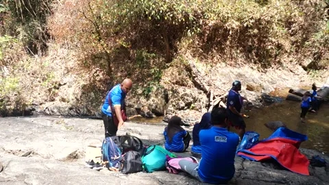 Hiking to the waterfall Stock Footage 146596267